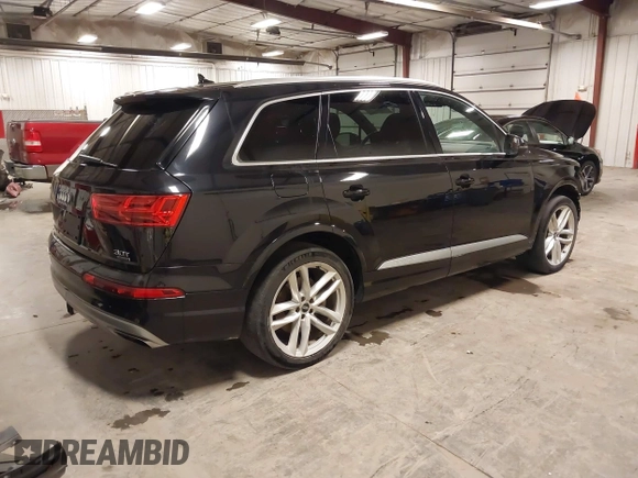 2017 Audi Q7 Prestige with VIN WA1VABF71HD043036, listed as a IAAI auction lot 42255140 with 90,009 mi miles and . Bid and sale history available at DreamBid. Image 4.