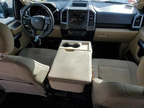 2015 Ford F-150 XLT w/HD Payload Pkg with VIN 1FTFW1EG3FFC17522, listed as a Copart auction lot 47593575 with 126,622 mi miles and Salvage Title. Bid and sale history available at carsss.com. Image 8.