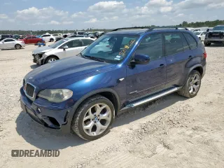 2011 BMW X5 35i z VIN 5UXZV4C59BL415373, wystawiony jako Copart lot #58092265 z przebiegiem 117 581 mil mil oraz Szkoda całkowita • Salvage title. Historia ofert i sprzedaży dostępna na DreamBid. Obrazek 1.