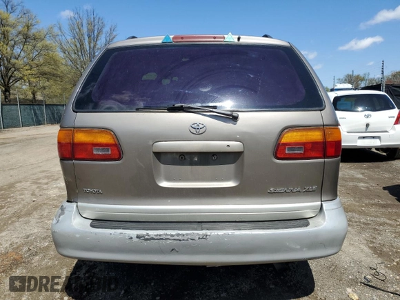 1999 Toyota Sienna LE with VIN 4T3ZF13C2XU112113, listed as a Copart auction lot 52162655 with 248,091 mi miles and Salvage Title. Bid and sale history available at carsss.com. Image 6.