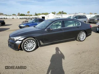 2018 BMW 7 Series 740i with VIN WBA7E2C50JG742052, listed as a Copart auction lot 72192053 with 31,946 mi miles and . Bid and sale history available at DreamBid. Image 1.