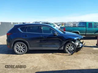 2019 Mazda CX-5 Grand Touring with VIN JM3KFBDM2K1685168, listed as a IAAI auction lot 41323598 with 88,429 mi miles. Bid and sale history available at carsss.com. Image 13.