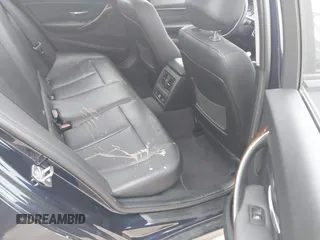 2015 BMW 3 Series 328i xDrive with VIN WBA3B3C54FJ984107, listed as a IAAI auction lot 41565829 with 98,557 mi miles and . Bid and sale history available at DreamBid. Image 8.