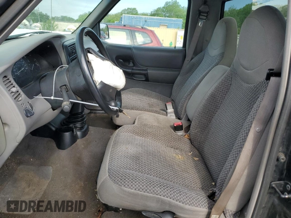 1999 Ford Ranger XL with VIN 1FTYR10C1XPB36812, listed as a Copart auction lot 54751214 with 277,416 mi miles and Salvage title. Bid and sale history available at DreamBid. Image 7.