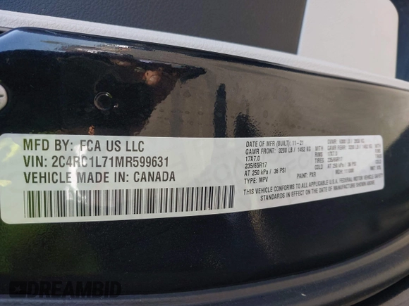2021 Chrysler Pacifica Hybrid Touring L with VIN 2C4RC1L71MR599631, listed as a IAAI auction lot 42151965 with 67,401 mi miles and . Bid and sale history available at DreamBid. Image 9.