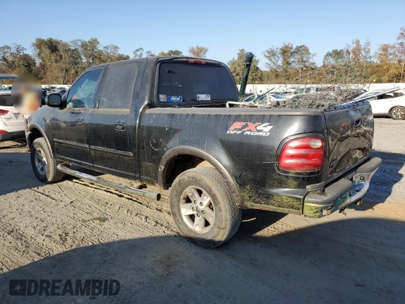 2003 Ford F-150 XLT with VIN 1FTRW08623KD45425, listed as a Copart auction lot 77605404 with 174,369 mi miles and Salvage Title. Bid and sale history available at carsss.com. Image 2.