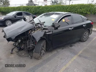 2019 Kia Optima EX with VIN 5XXGU4L14KG290842, listed as a IAAI auction lot 42030617 with Not Provided miles and . Bid and sale history available at carsss.com. Image 2.
