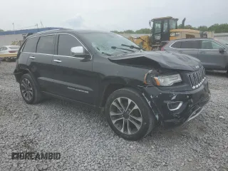 2015 Jeep Grand Cherokee Overland с VIN 1C4RJECG9FC620315, выставлен на аукционе Copart как лот 54569845 с пробегом 219 905 миль миль и Списание • Salvage title. История ставок и продаж доступна на DreamBid. Изображение 4.