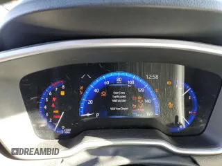 2022 Toyota Corolla Cross XLE z VIN 7MUDAABG2NV043649, wystawiony jako Copart lot #76577044 z przebiegiem 9 495 mil mil oraz Szkoda całkowita • Salvage title. Historia ofert i sprzedaży dostępna na DreamBid. Obrazek 9.