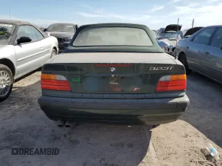1999 BMW 3 Series 323icA with VIN WBABJ8332XEM23389, listed as a Copart auction lot 76185804 with 0 mi miles and Salvage Title. Bid and sale history available at carsss.com. Image 6.
