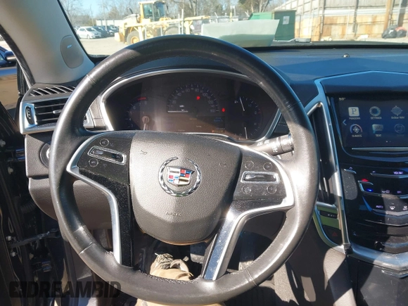2015 Cadillac SRX with VIN 3GYFNAE35FS608595, listed as a IAAI auction lot 41282751 with 127,055 mi miles and . Bid and sale history available at DreamBid. Image 21.