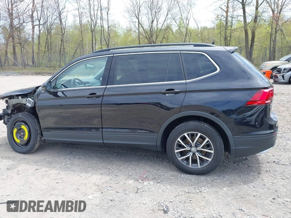 2019 Volkswagen Tiguan SE with VIN 3VV2B7AX7KM174382, listed as a IAAI auction lot 42147584 with 64,460 mi miles and . Bid and sale history available at DreamBid. Image 14.