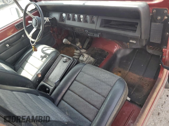 1987 Jeep Wrangler z VIN 2BCCV8137HB529480, wystawiony jako Copart lot #60081245 z przebiegiem 717 279 mil mil oraz Czysty tytuł • Clean title. Historia ofert i sprzedaży dostępna na DreamBid. Obrazek 8.