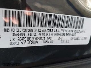 2015 Chrysler Town & Country Touring with VIN 2C4RC1BG1FR609174, listed as a IAAI auction lot 41527536 with 168,818 mi miles. Bid and sale history available at carsss.com. Image 9.