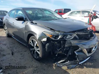 2018 Nissan Maxima Platinum z VIN 1N4AA6AP7JC397986, wystawiony jako IAAI lot #41646623 z przebiegiem 98 359 mil mil oraz . Historia ofert i sprzedaży dostępna na DreamBid. Obrazek 1.