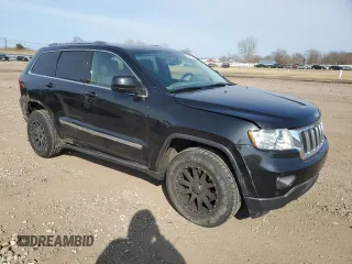 2012 Jeep Grand Cherokee Laredo with VIN 1C4RJFAG5CC280262, listed as a Copart auction lot 48686475 with 130,673 mi miles and Salvage Title. Bid and sale history available at carsss.com. Image 4.