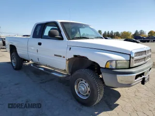 2001 Dodge Ram 2500 with VIN 1B7KF23Z91J617454, listed as a Copart auction lot 76976994 with 95,067 mi miles and Salvage Title. Bid and sale history available at carsss.com. Image 4.