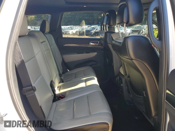 2017 Jeep Grand Cherokee Limited 75th Anniversary with VIN 1C4RJFBG5HC688475, listed as a Copart auction lot 75327564 with 76,830 mi miles and Salvage title. Bid and sale history available at DreamBid. Image 12.