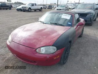 1999 Mazda MX-5 Miata z VIN JM1NB3531X0129508, wystawiony jako IAAI lot #41601347 z przebiegiem 156 702 mil mil oraz . Historia ofert i sprzedaży dostępna na DreamBid. Obrazek 2.
