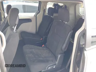 2017 Dodge Grand Caravan SE with VIN 2C4RDGBG3HR660839, listed as a IAAI auction lot 42003578 with Not Provided miles and . Bid and sale history available at DreamBid. Image 8.