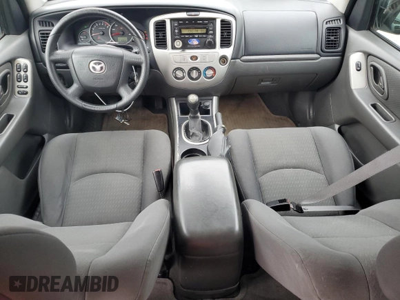 2005 Mazda Tribute i with VIN 4F2YZ02ZX5KM17738, listed as a Copart auction lot 72346384 with 203,245 mi miles and Salvage Title. Bid and sale history available at carsss.com. Image 8.
