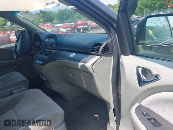2007 Honda Odyssey LX with VIN 5FNRL38267B029066, listed as a IAAI auction lot 42502433 with 185,721 mi miles and . Bid and sale history available at DreamBid. Image 5.