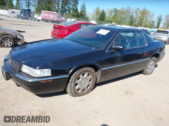 1998 Cadillac Eldorado Touring with VIN 1G6ET1295WU610253, listed as a IAAI auction lot 42066181 with 85,172 mi miles and . Bid and sale history available at DreamBid. Image 2.