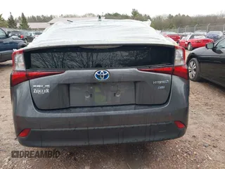 2021 Toyota Prius L Eco with VIN JTDKAMFU6M3140081, listed as a IAAI auction lot 42131187 with 103,973 mi miles and . Bid and sale history available at DreamBid. Image 16.