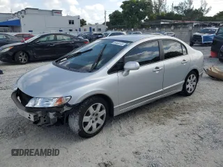 2006 Honda Civic LX with VIN 1HGFA16576L097948, listed as a Copart auction lot 54504125 with 115,094 mi miles and Salvage title. Bid and sale history available at DreamBid. Image 1.