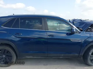 2021 Volkswagen Atlas SE z VIN 1V2WC2CA4MC232301, wystawiony jako IAAI lot #42538962 z przebiegiem Nie podano mil oraz . Historia ofert i sprzedaży dostępna na DreamBid. Obrazek 14.