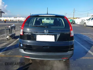 2014 Honda CR-V LX with VIN 3CZRM3H37EG717200, listed as a IAAI auction lot 41424082 with 58,888 mi miles. Bid and sale history available at carsss.com. Image 15.
