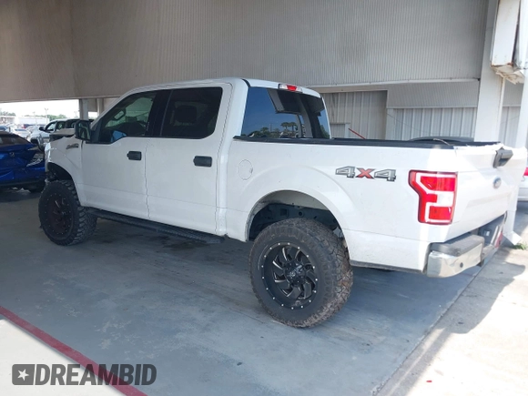 2019 Ford F-150 XL with VIN 1FTEW1E55KFB69767, listed as a IAAI auction lot 42326370 with 143,523 mi miles and . Bid and sale history available at DreamBid. Image 3.
