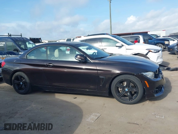 2014 BMW 4 Series 428i with VIN WBA3V5C50EP751257, listed as a IAAI auction lot 42431133 with 99,070 mi miles and . Bid and sale history available at DreamBid. Image 13.