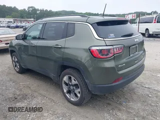 2020 Jeep Compass Limited with VIN 3C4NJDCB2LT127296, listed as a IAAI auction lot 42555235 with 105,259 mi miles and . Bid and sale history available at DreamBid. Image 3.