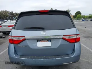 2012 Honda Odyssey EX-L with VIN 5FNRL5H66CB061847, listed as a IAAI auction lot 42162377 with 217,204 mi miles and . Bid and sale history available at DreamBid. Image 16.