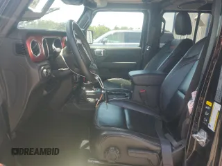 2022 Jeep Wrangler Unlimited Rubicon with VIN 1C4HJXFG1NW193437, listed as a Copart auction lot 57137365 with 56,732 mi miles and Salvage title. Bid and sale history available at DreamBid. Image 7.