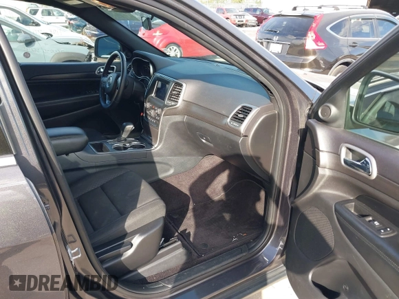 2018 Jeep Grand Cherokee Altitude with VIN 1C4RJFAG9JC459143, listed as a IAAI auction lot 38138630 with 71,150 mi miles and . Bid and sale history available at DreamBid. Image 5.