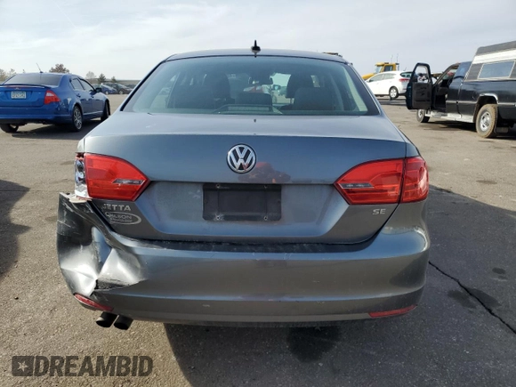 2014 Volkswagen Jetta Sedan SE with VIN 3VWD17AJXEM226076, listed as a Copart auction lot 48936465 with 130,269 mi miles and Salvage Title. Bid and sale history available at carsss.com. Image 6.