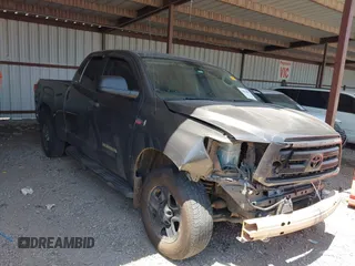 2013 Toyota Tundra with VIN 5TFUY5F19DX275435, listed as a IAAI auction lot 42564657 with 259,867 mi miles and . Bid and sale history available at DreamBid. Image 1.