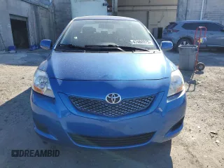 2009 Toyota Yaris with VIN JTDBT903891323833, listed as a Copart auction lot 47460975 with 134,524 mi miles and Salvage Title. Bid and sale history available at DreamBid. Image 5.