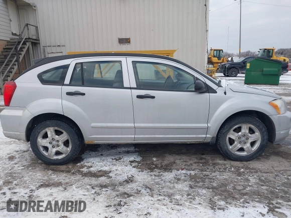 2007 Dodge Caliber SXT with VIN 1B3HB48B07D159549, listed as a IAAI auction lot 41330969 with 124,911 mi miles and . Bid and sale history available at DreamBid. Image 13.