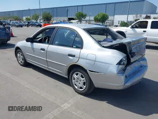 2001 Honda Civic LX with VIN 2HGES16591H619719, listed as a IAAI auction lot 42183571 with 294,983 mi miles. Bid and sale history available at carsss.com. Image 3.