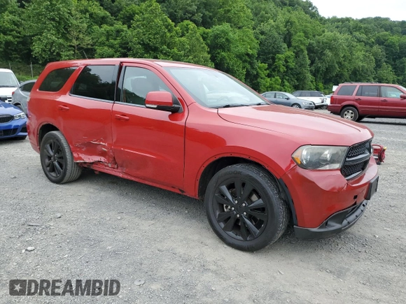 2013 Dodge Durango R/T with VIN 1C4SDJCTXDC688165, listed as a Copart auction lot 61071195 with 139,075 mi miles and Salvage title. Bid and sale history available at DreamBid. Image 4.