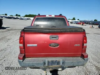 2007 Ford Explorer Sport Trac XLT with VIN 1FMEU51887UA09474, listed as a Copart auction lot 57625115 with 128,443 mi miles and Salvage title. Bid and sale history available at DreamBid. Image 6.