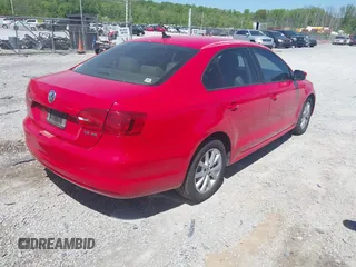 2012 Volkswagen Jetta Sedan SE w/Convenience with VIN 3VWDX7AJOCM340325, listed as a IAAI auction lot 42053766 with 171,254 mi miles. Bid and sale history available at carsss.com. Image 4.