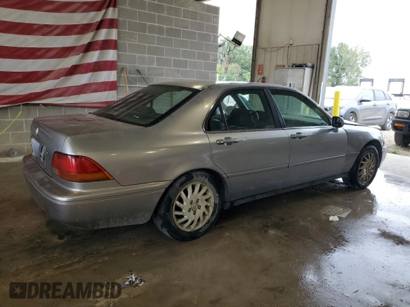 1998 Acura RL Premium with VIN JH4KA965XWC012742, listed as a Copart auction lot 73298574 with 0 mi miles and Salvage Title. Bid and sale history available at carsss.com. Image 3.