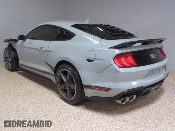 2023 Ford Mustang Mach 1 with VIN 1FA6P8R02P5502244, listed as a Copart auction lot 46698935 with 12,573 mi miles and Clean title. Bid and sale history available at DreamBid. Image 4.