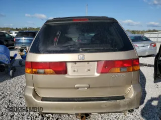 2002 Honda Odyssey EX z VIN 2HKRL18612H503328, wystawiony jako Copart lot #52699095 z przebiegiem 241 741 mil mil oraz Szkoda całkowita • Salvage title. Historia ofert i sprzedaży dostępna na DreamBid. Obrazek 6.
