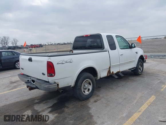 2003 Ford F-150 XL with VIN 1FTRX18L73NB72735, listed as a IAAI auction lot 42016567 with 0 mi miles. Bid and sale history available at carsss.com. Image 4.