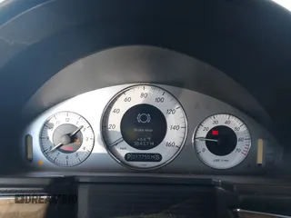 2009 Mercedes-Benz E-Class Luxury 3.5L with VIN WDBUF56X29B409585, listed as a IAAI auction lot 42046431 with 217,755 mi miles. Bid and sale history available at carsss.com. Image 7.